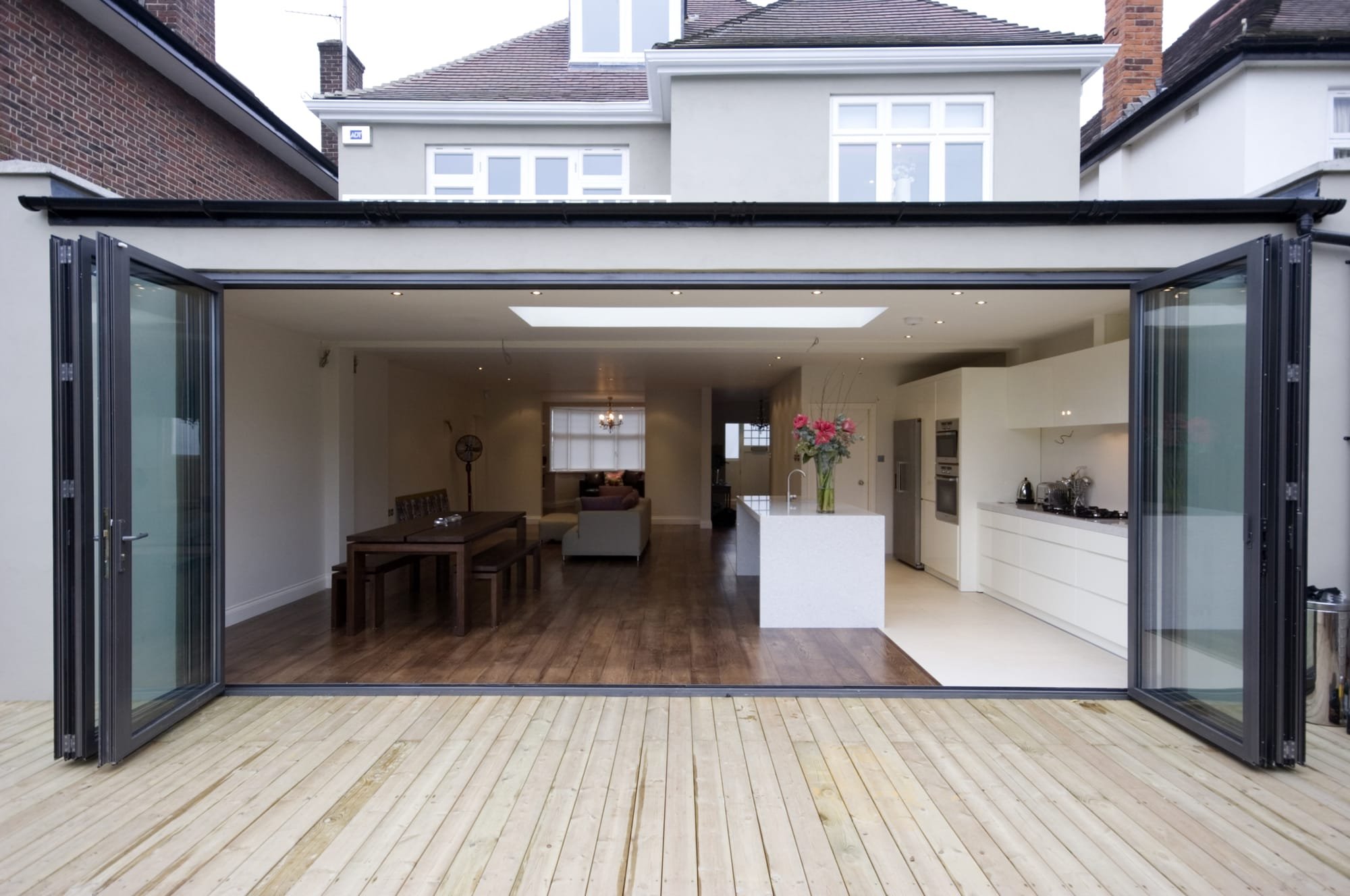 Large rear / side / wrap around extension on this Balham detatched house with bi-fold doors