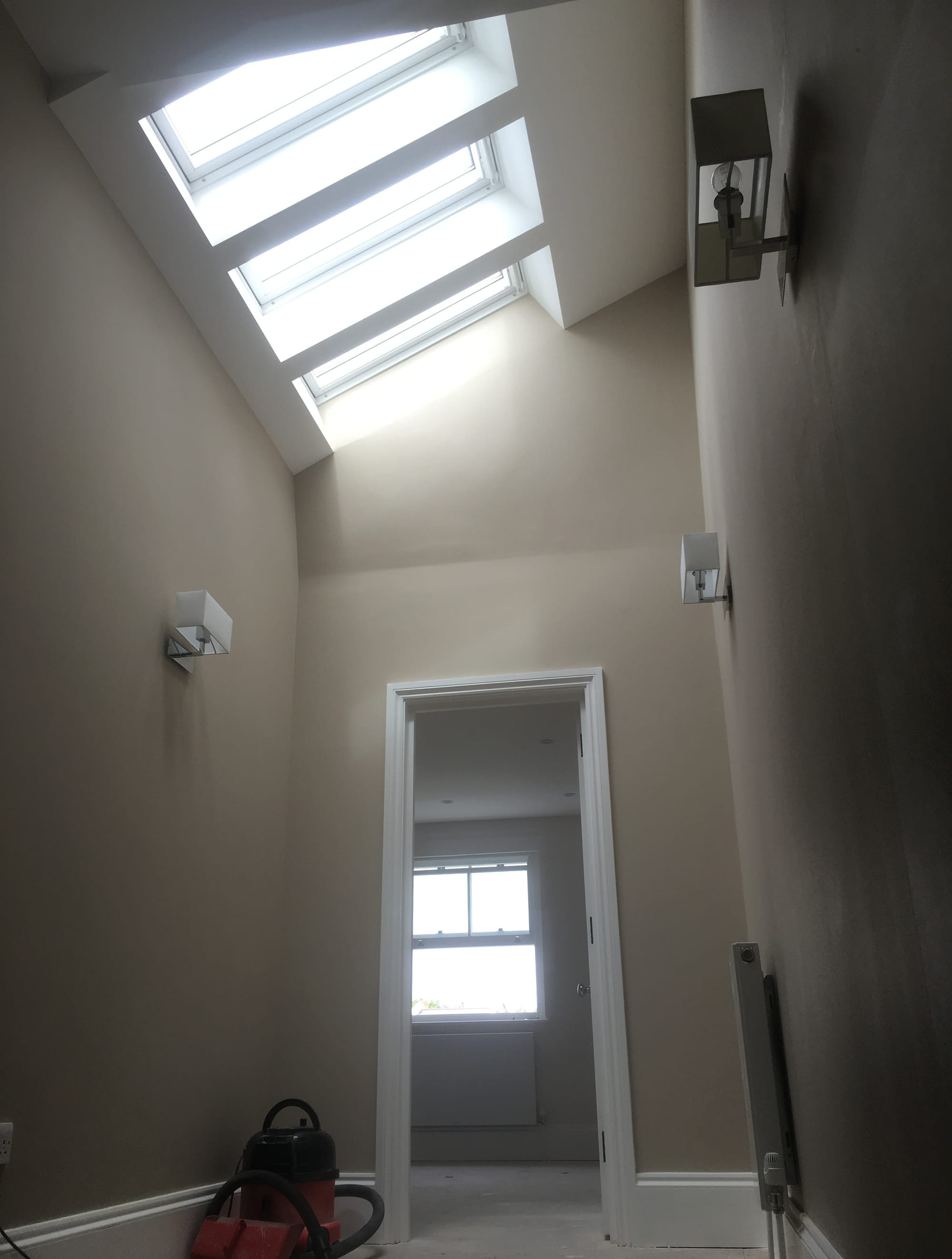 Velux flooding landing area outside bedroom of this SW12 rear loft conversion