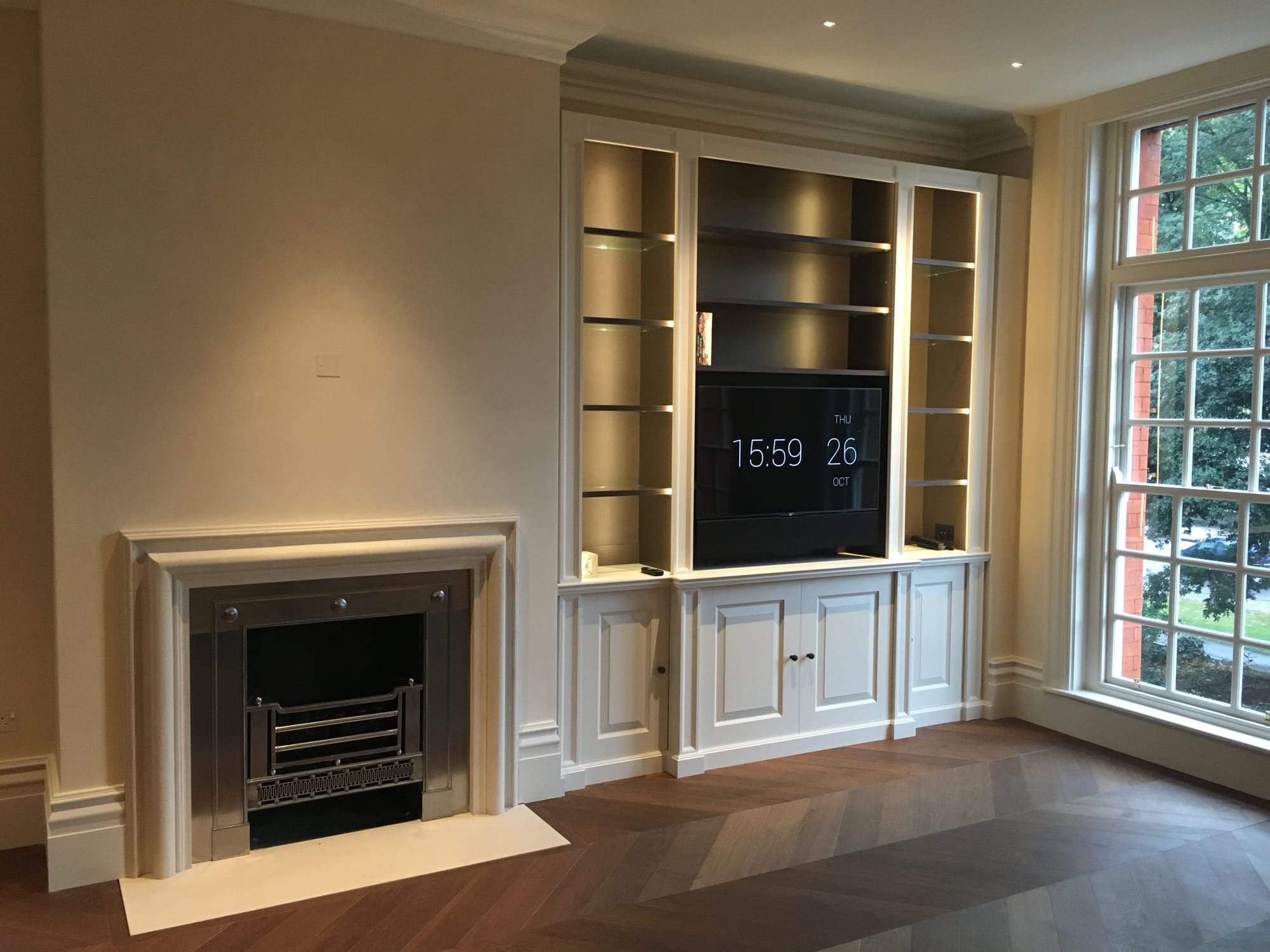Bespoke joinery / media wall and new fireplace as part of SW3 flat refurbishment
