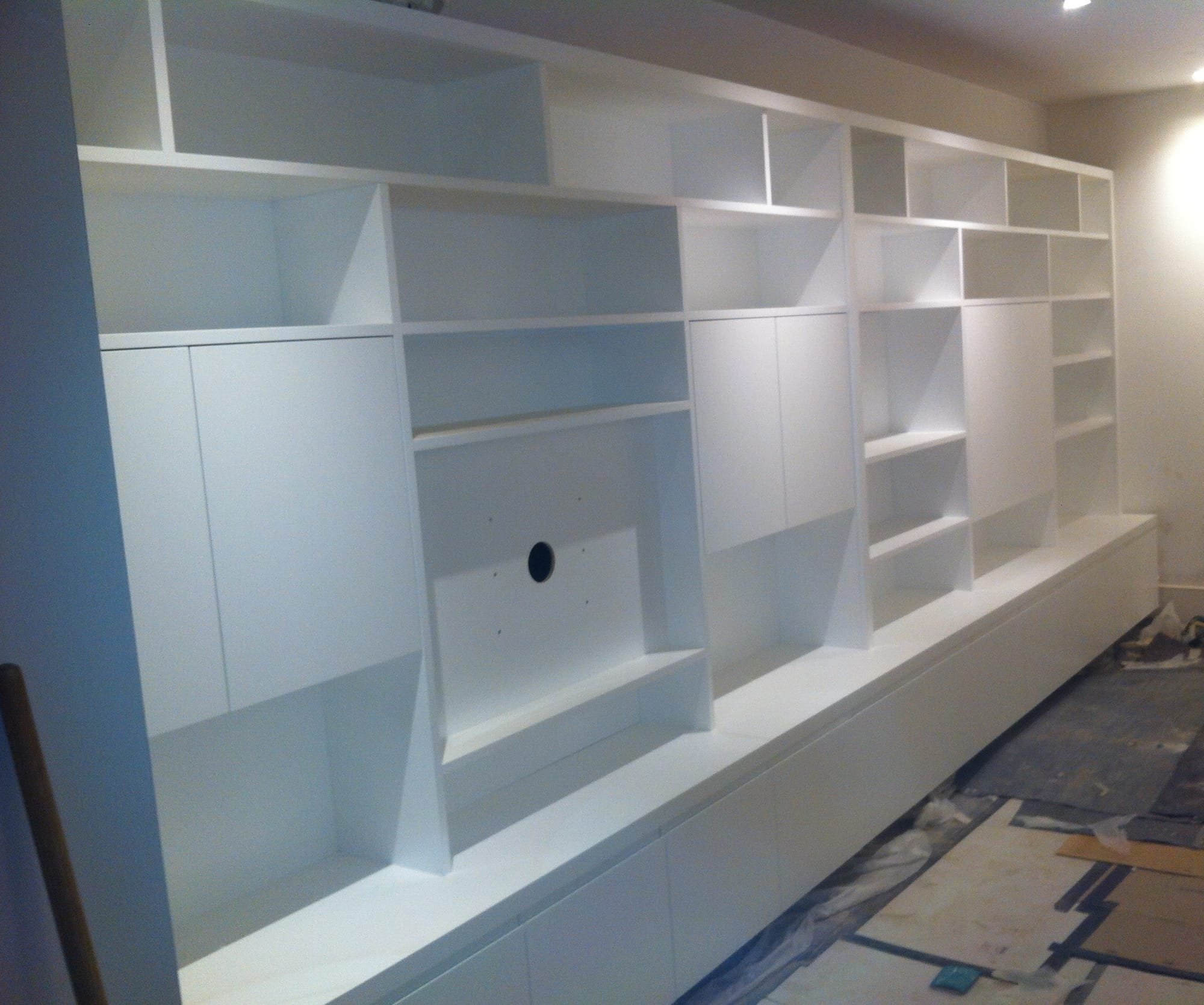 Huge piece of bespoke joinery fitted to this Clapham, SW11 basement.