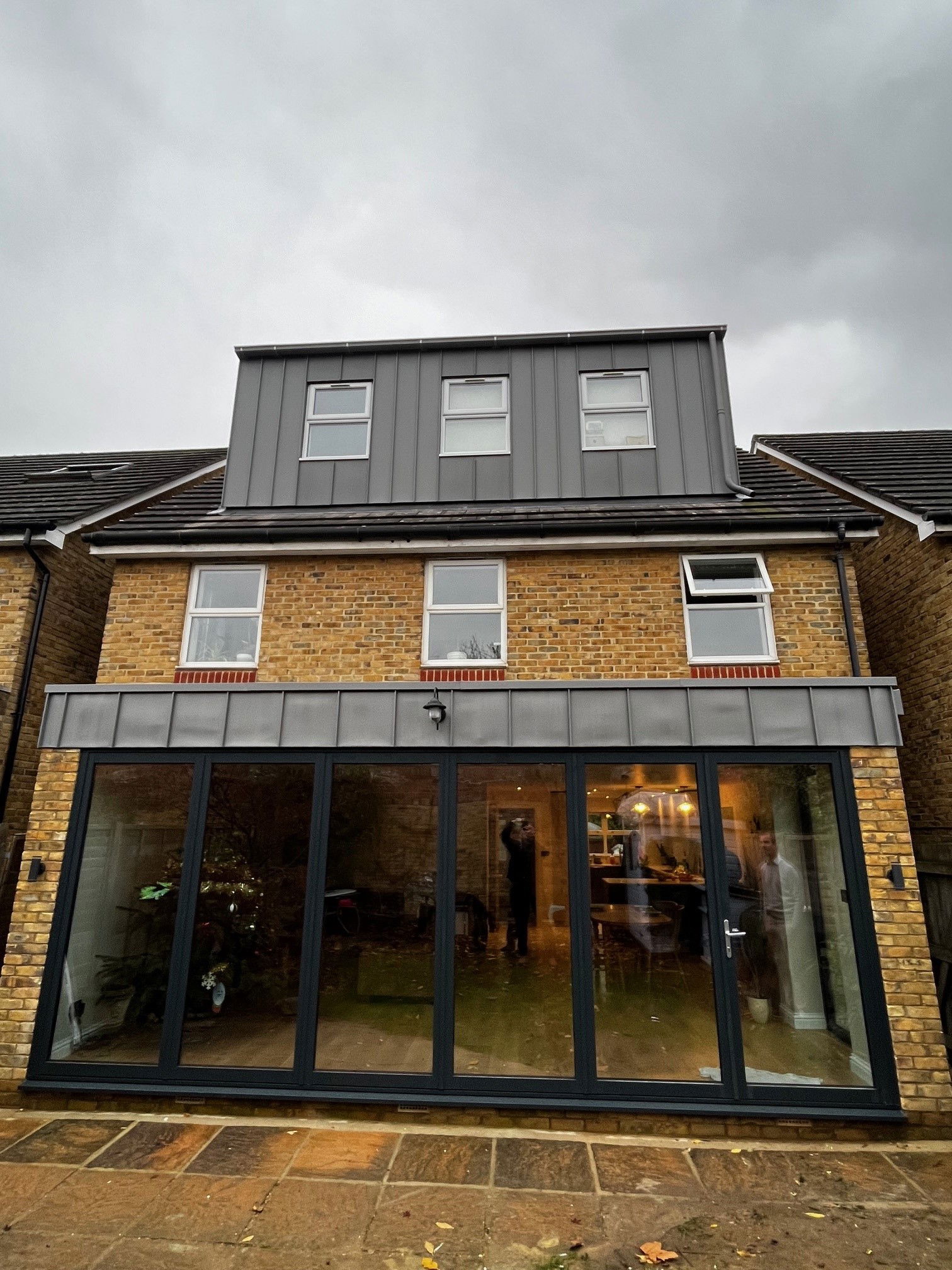 Wandsworth rear kitchen extension on this modern mews property with zinc cladding to match the existing loftloft