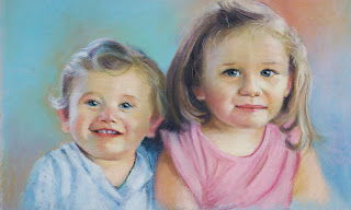 Two children in pastel
