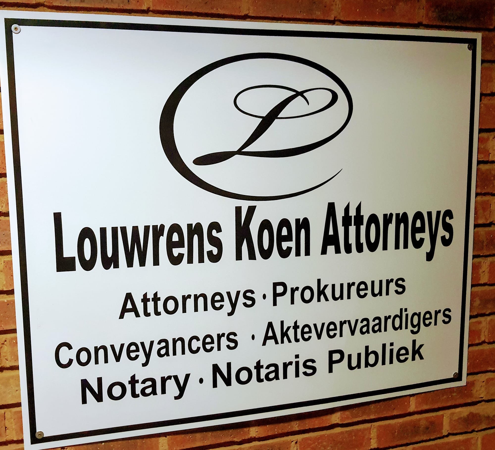 Signage Louwrens Koen Attorneys on the Second Floor