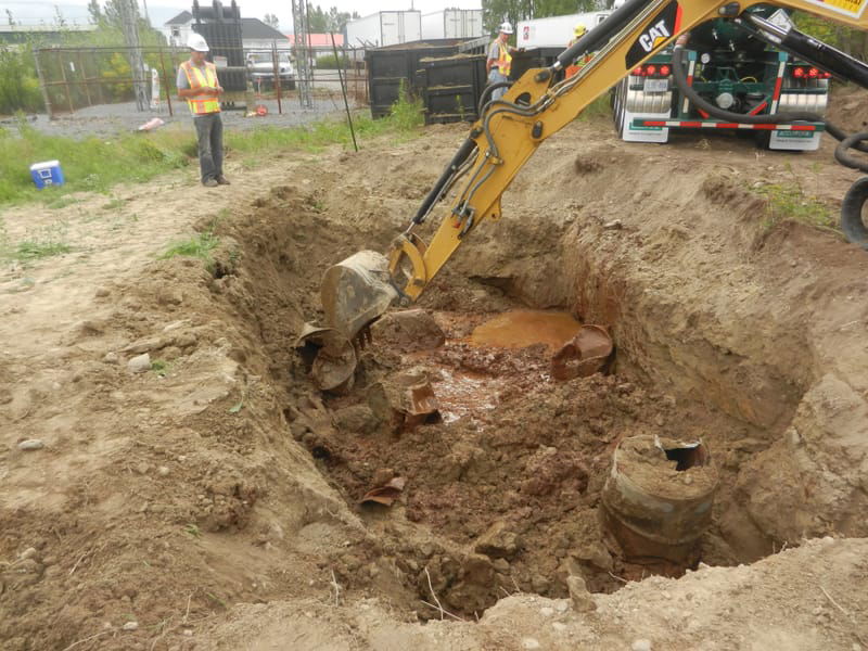 SOIL AND GROUNDWATER REMEDIATION AND BURIED TANK REMOVAL