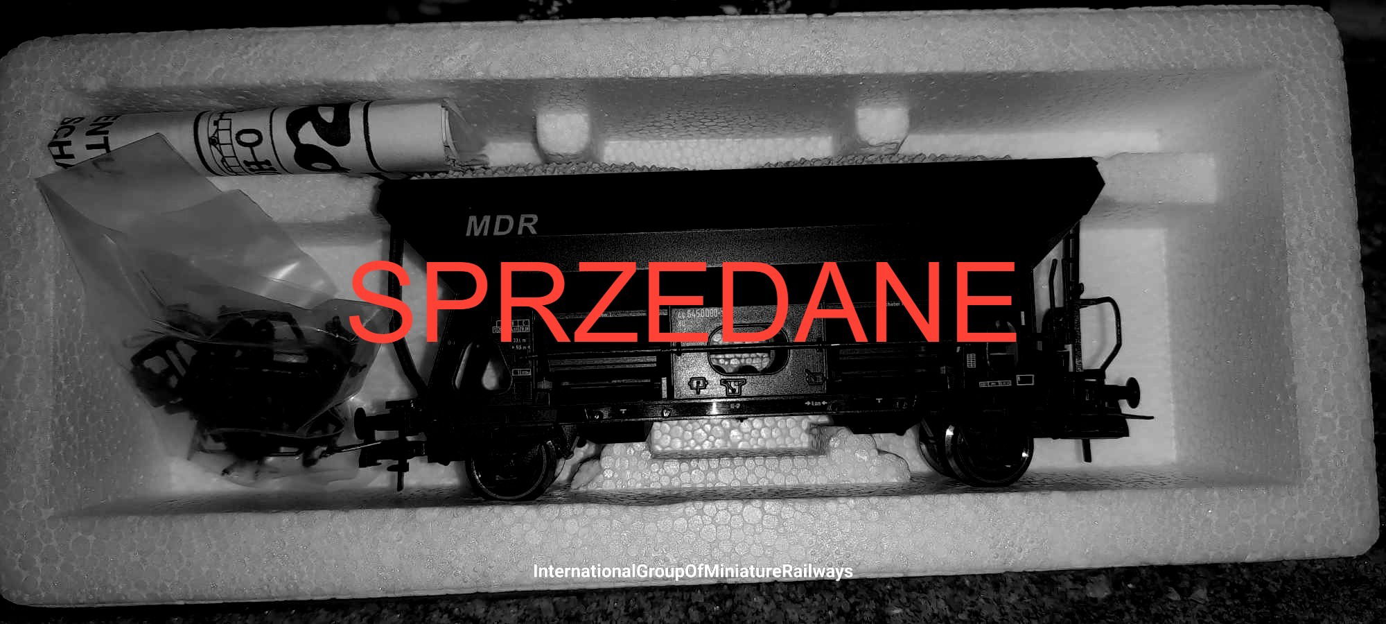 Roco 47487 MDR wagon rozładunkowy z balastem No196