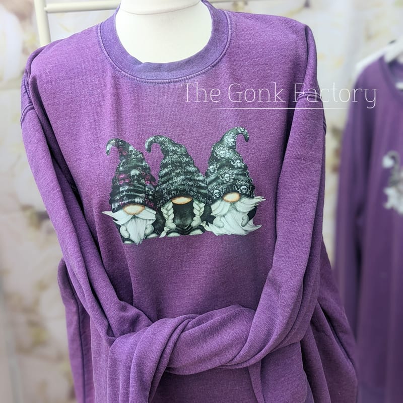 Purple Jumper With 'Gothic Gonks'