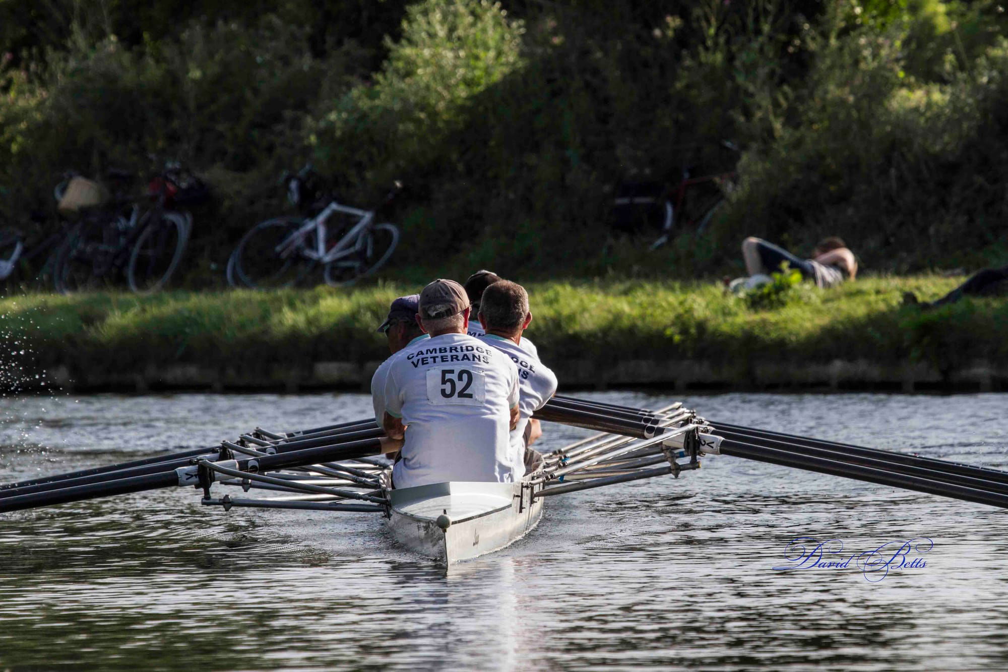 Rowing down to join a race.