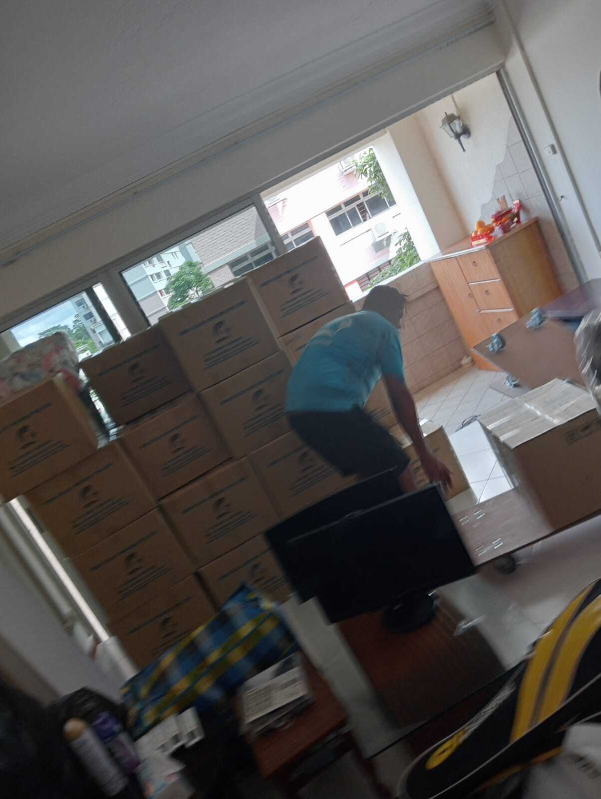 movers moving out boxed item