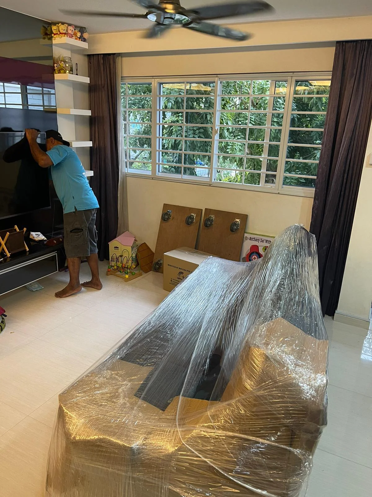 wrapping sofa and television