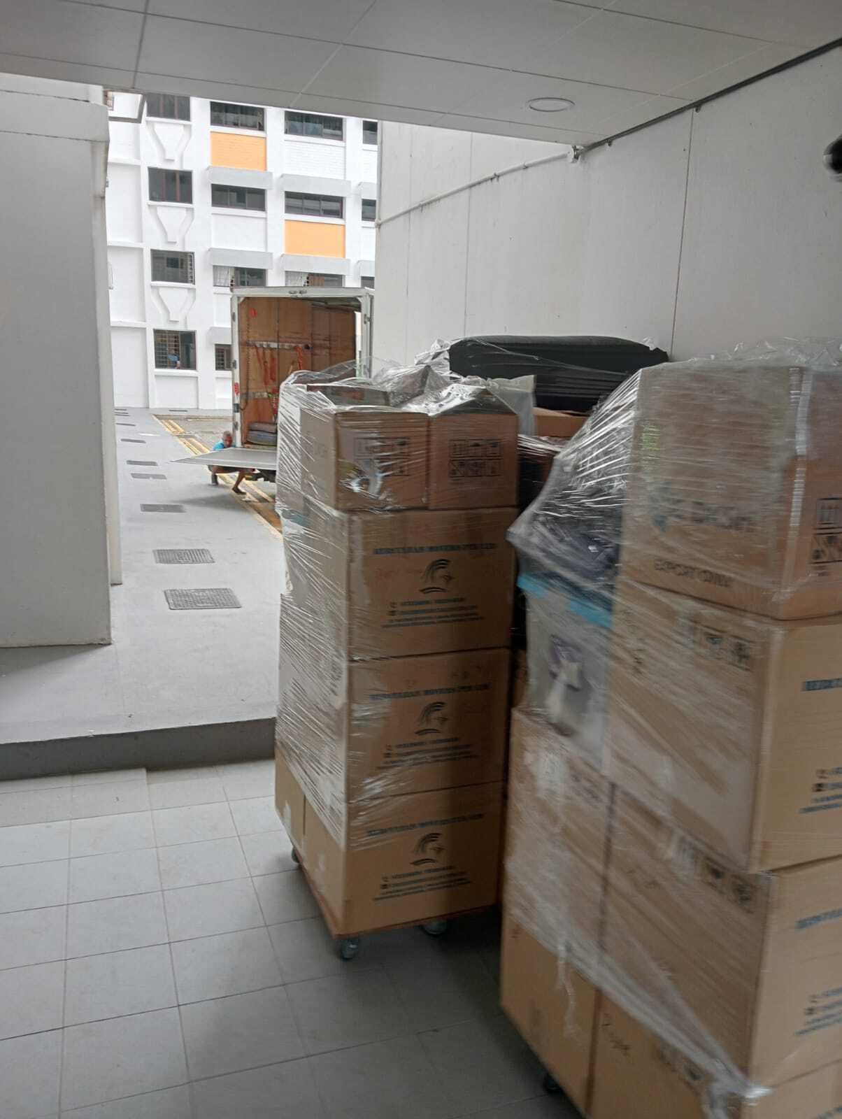 boxes on trolley in hallway