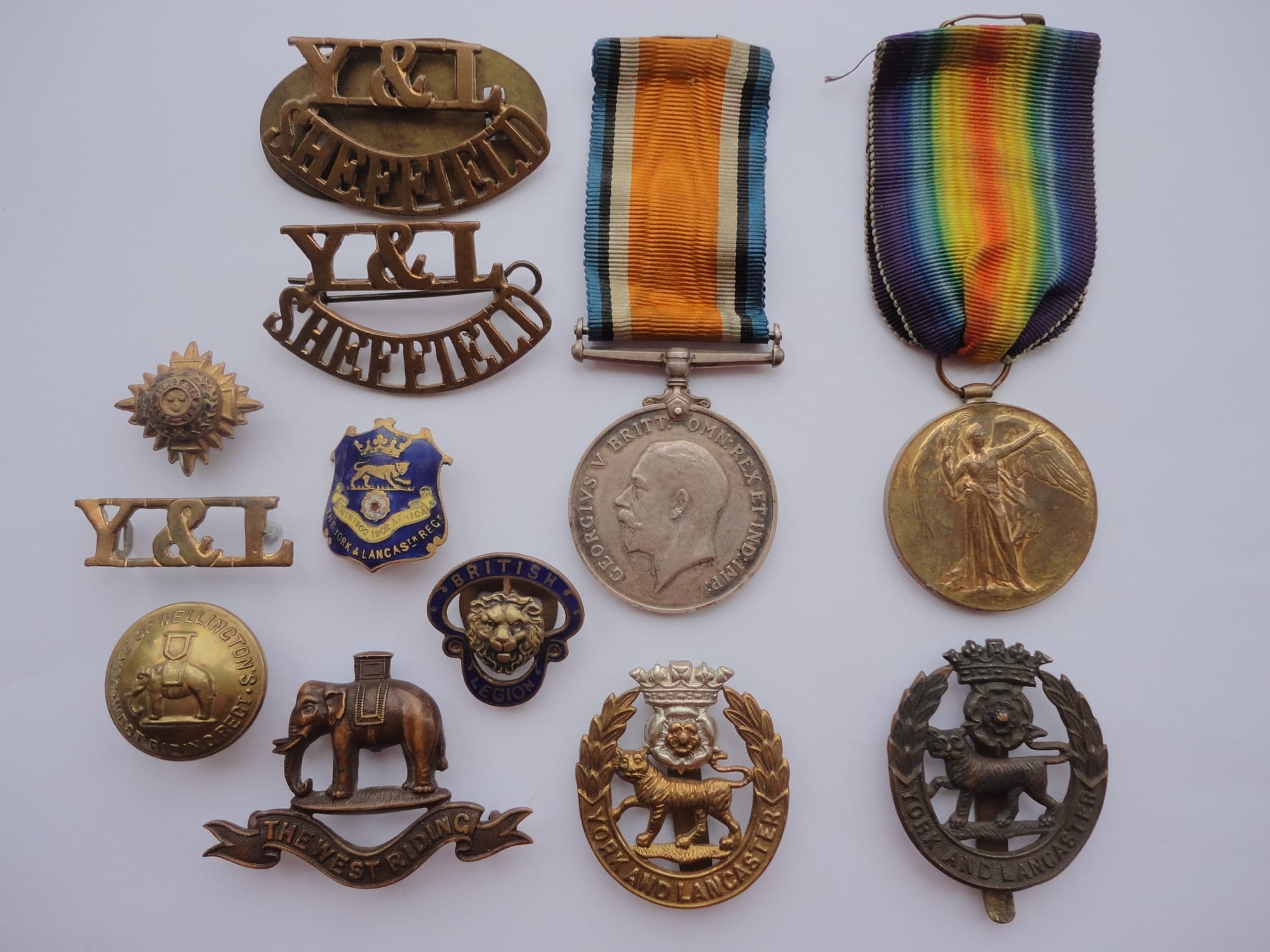 Medals & Badges to John Stanley Wood Sheffield Pals