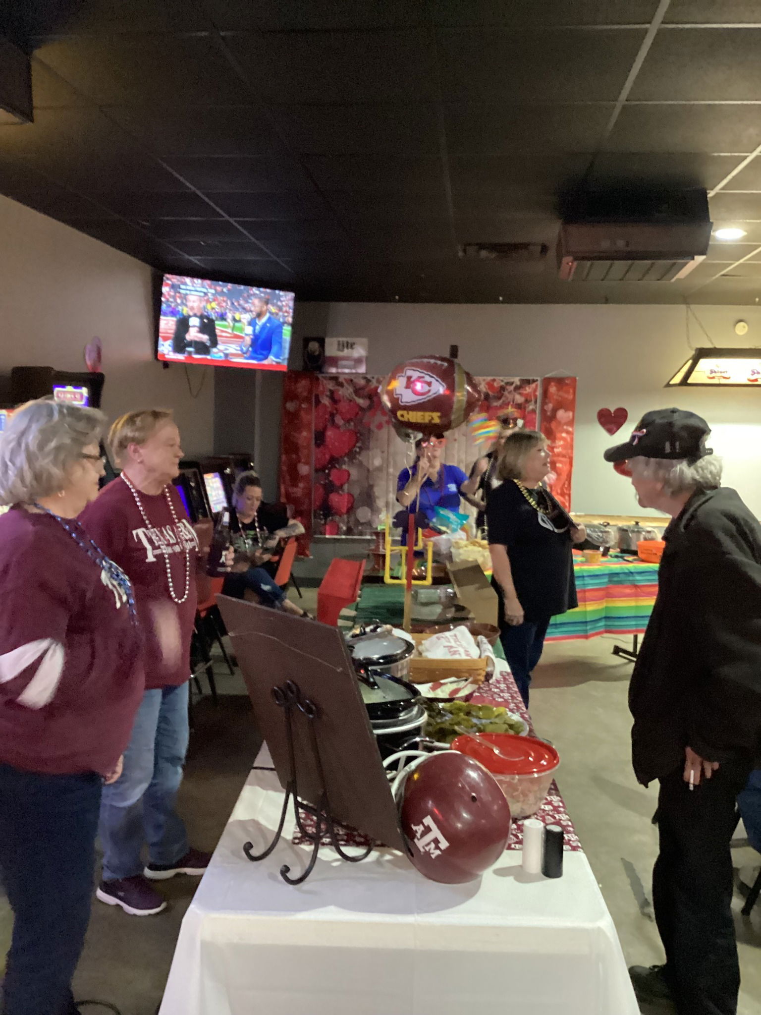 Judge Bob at that Aggie's Table with Janet and Deb