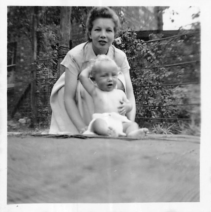 With mum as a baby