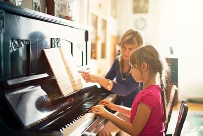 The Benefits of Taking Piano Lessons image