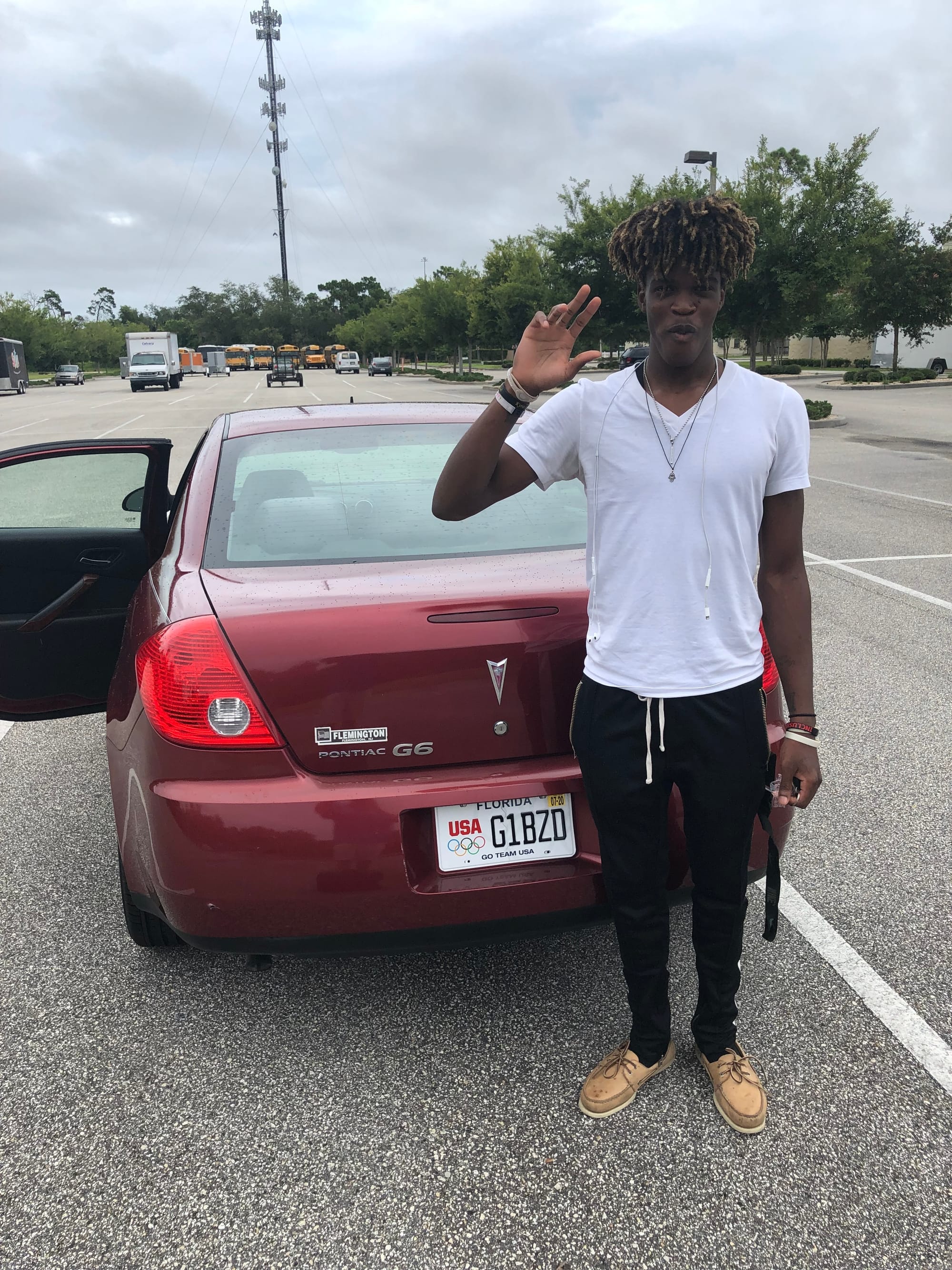 Our son Na’Quavion getting his car from the Excellerate ministry