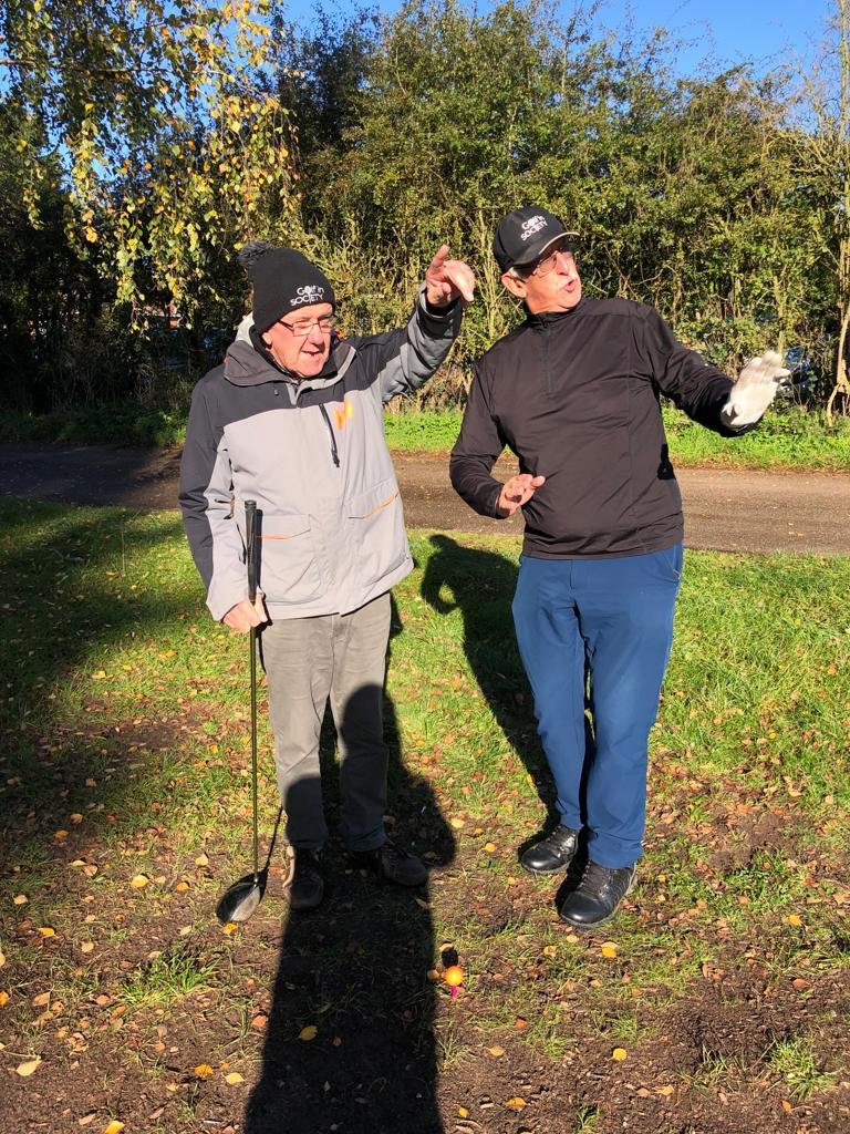 Golf in Society - John and Tony (discussing ball flight)