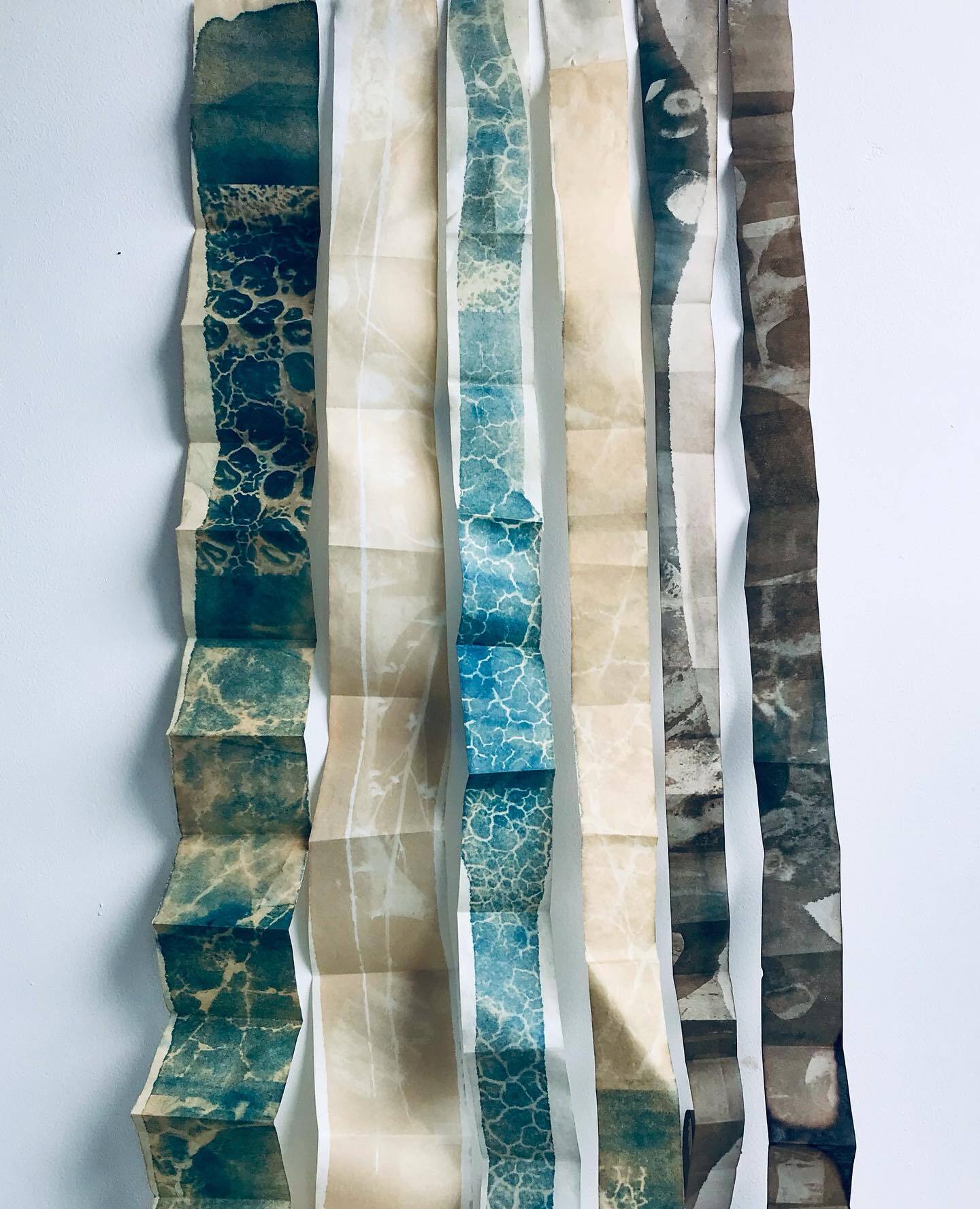 Vertical Landcapes,  botanically toned cyanotypes of rock face forms, fissures and coastal lichens