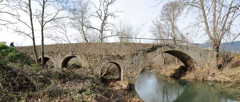 River stone bridge at the site "Neroutsos' Mill"