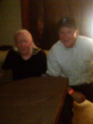 Gator with Hall of Fame Rocker Johnny Winter visiting in Johnny's Tour bus a few years ago.