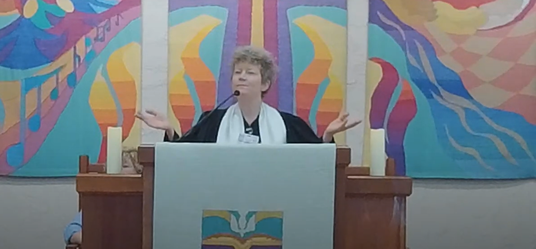 Pastor Elizabeth leads worship
