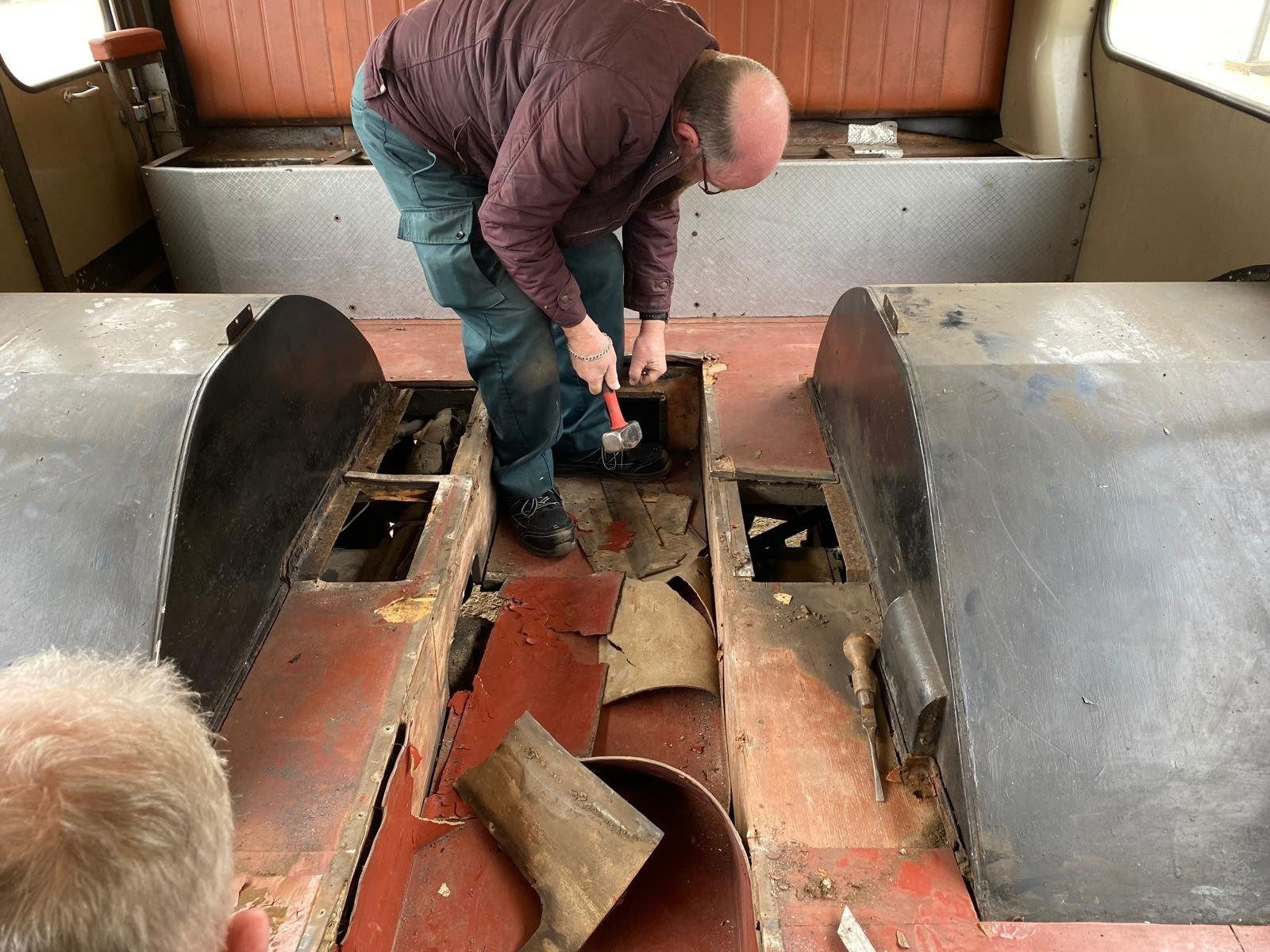Don and John working on restoration of the floor of VR190