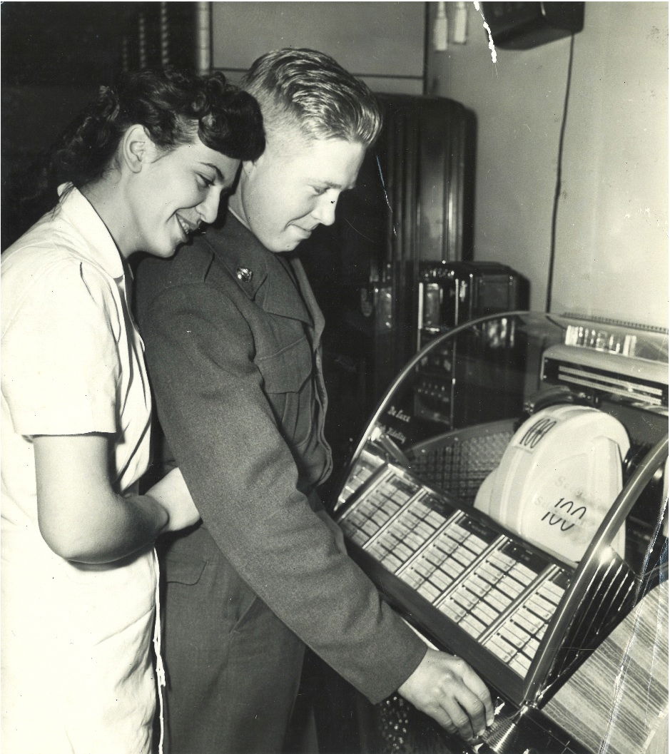 Gary Walker (with fan Alice Corey) listening to George Morgan's cut of his song, "Look What Followed Me Home Tonight", just after it was released.